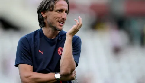 AC Milan?s Croatian midfielder #14 Luka Modric reacts prior to the Italian Serie A football match between Torino FC and AC Milan at the Olympic Stadium Grande Torino in Turin, northern Italy on August 23, 2026. (Photo by Marco Bertorello/AFP)