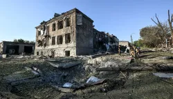The State Center for Standardization, Metrology and Certification (L), destroyed in a massive combined Russian strike on Zaporizhzhia, Ukraine, on August 11, 2026. Overnight on August 11, Russian forces launched a massive combined strike on Zaporizhzhia, firing 10 missiles at the city, including a North Korean ballistic missile and Zircon hypersonic missiles, as well as guided aerial bombs (KABs). The attack completely destroyed the State Center for Standardization, Metrology and Certification and damaged or destroyed a number of industrial facilities and civilian infrastructure sites, including food establishments, four apartment buildings and a garage cooperative, where the blast wave demolished garages and dozens of vehicles. Six people were killed and 52 others were injured in the attack Photo by Dmytro Smolienko/Ukrinform/ABACAPRESS.COM Photo: Smoliyenko Dmytro/Ukrinform/ABACA/ABACA