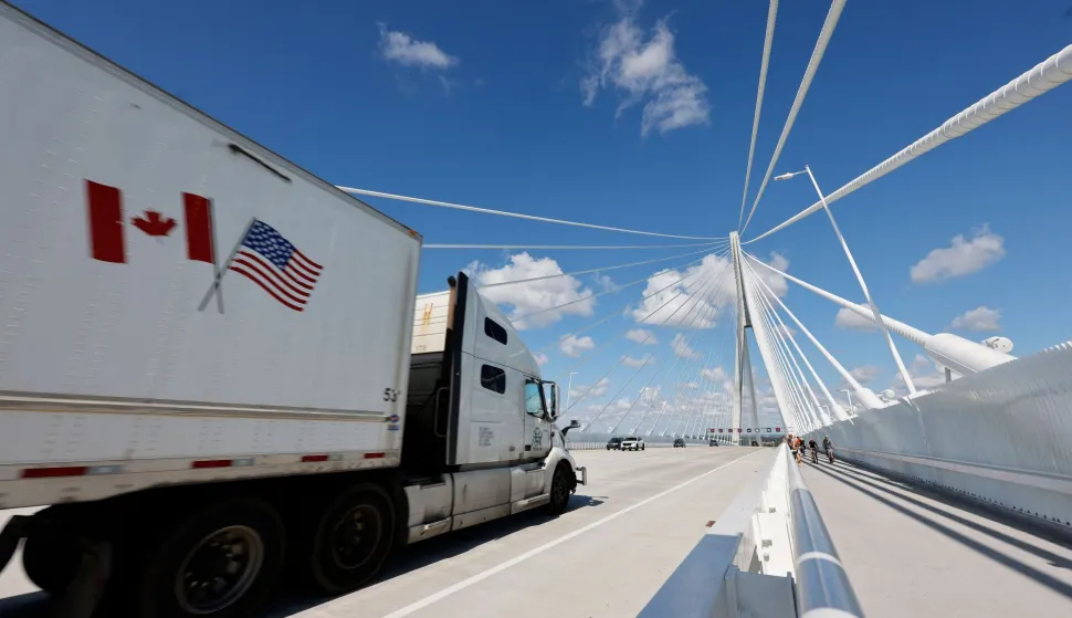 A truck crosses into the United States from Canada on the Gordie Howe International Bridge, connecting Windsor, Ontario, and Detroit, Michigan, on September 6, 2026. Canada announced on August 25, 2026 counter-tariffs on US goods ranging between 15 and 50 percent, intensifying the trade war between the historically close allies. Ottawa's retaliation will take effect September 8, a timeframe earlier outlined by Prime Minister Mark Carney after US President Donald Trump's 50-percent duties came into place August 22, 2026. (Photo by JEFF KOWALSKY/AFP)