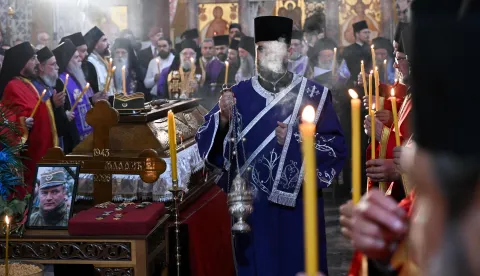 An orthodox priest blesses the coffin of late Bosnian Serb military leader Ratko Mladic during a funeral ceremony at St Lukas church in Belgrade on September 7, 2026. Mladic, 84, died last week after suffering several strokes while serving a life sentence in The Hague for war crimes committed during the 1990s war in Bosnia. (Photo by OLIVER BUNIC/AFP)