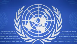 This photograph shows a logo of the United Nations (UN) at their offices in Geneva, on September 3, 2026. (Photo by Fabrice COFFRINI/AFP)