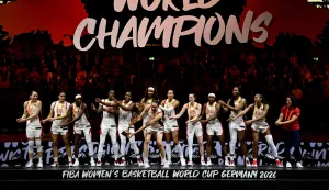 USA's team celebrates with the trophy after the 2026 FIBA Women?s Basketball World Cup final game between the United States and France in Berlin on September 13, 2026. (Photo by Tobias SCHWARZ/AFP)