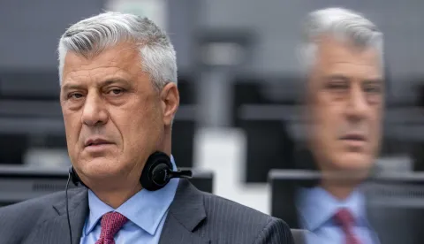 (FILES) Former Kosovo President Hashim Thaci sits for the first time before a war crimes court in The Hague on November 9, 2020, to face charges relating to the 1990s conflict with Serbia. The Hague war crimes trial against Kosovo's ex-president and former guerrilla leader Hashim Thaci, along with three other senior rebel figures, began hearing closing statements on February 9, 2026 -- the final phase before it retires to deliver a verdict. All four face charges of war crimes and crimes against humanity, over their alleged responsibility for killings, torture and other abuses committed by KLA members. (Photo by Jerry Lampen/POOL/AFP)/Netherlands OUT