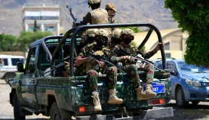 Yemen's Houthi armed forces patrol as Yemeni prisoners loyal to the Houthi authorities arrive in the capital Sanaa on September 12, 2026, after being released on the west coast where he and others were being held by Yemen's Saudi-backed government forces. Some 210 prisoners were released following a week-long offensive, in which the Iran-backed Houthis on September 11, 2026, captured Yemen's Red Sea coast from the internationally recognised government, cementing their hold on the Bab al-Mandab Strait, a vital artery for Saudi Arabian oil exports as the Strait of Hormuz remains closed amid the US-Iran war. (Photo by Mohammed HUWAIS/AFP)HUTISTI, JEMEN