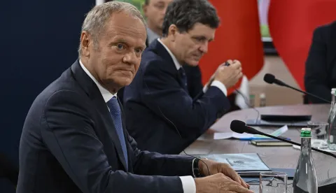 Poland's Prime Minister Donald Tusk (L) attends the Carpathian 8 summit in the state residence in Ivano-Frankivsk region on September 18, 2026, amid the Russian invasion of Ukraine. (Photo by Genya SAVILOV/AFP)