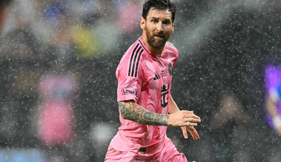 TOPSHOT - Inter Miami's Argentine forward #10 Lionel Messi runs under a light rain during the Campeones Cup final football match between Inter Miami CF and Mexico's Cruz Azul at Nu Stadium in Miami, Florida, on September 16, 2026. (Photo by CHANDAN KHANNA/AFP)