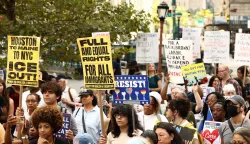 People hold signs during a protest against the termination of Temporary Protected Status (TPS) for the Haitian community and to end mass deportations, at Foley Square in New York City on August 28, 2026. The Supreme Court said in late June 2026 that the Trump administration is allowed to end Temporary Protected Status (TPS) for Haitians and some 6,000 Syrians without judicial review, although the impact of the decision could apply to migrants from many other backgrounds. An estimated 350,000 Haitians live in the United States under the program, with many working in healthcare and construction. (Photo by CHARLY TRIBALLEAU/AFP)