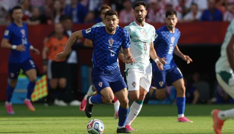Torongo, 03.07.2026 - Utakmica 1/16 finala Svjetskog nogometnog prvenstva Portugal - Hrvatska u Torontu. Na slici Mateo Kovačić, Bruno Fernandes.foto HINA/ Daniel KASAP/ ds