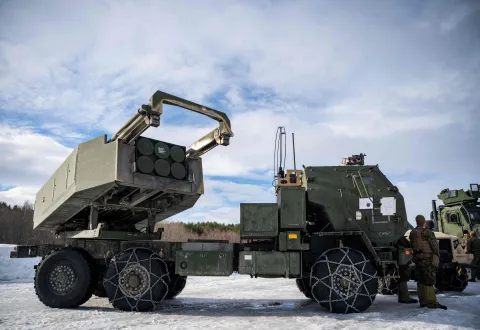 (FILES) A US M142 High Mobility Artillery Rocket System (HIMARS) is on display during a demonstration near Setermoen on March 12, 2026, as NATO conducts its Cold Response military exercise. Sweden's government said on September 7, 2026 that the country would spend seven billion kronor (USD 730 million) to buy US-made HIMARS rocket artillery for it military. The government said in a statement that the acquisition would "enable the Swedish Armed Forces to operate over larger areas, and with greater long-range capacity than with current systems." Defence Minister Pal Jonson told reporters that the deal covered about 10 trucks equipped with launchers and a large quantity of ammunition, news agency TT reported. (Photo by John MACDOUGALL/AFP)