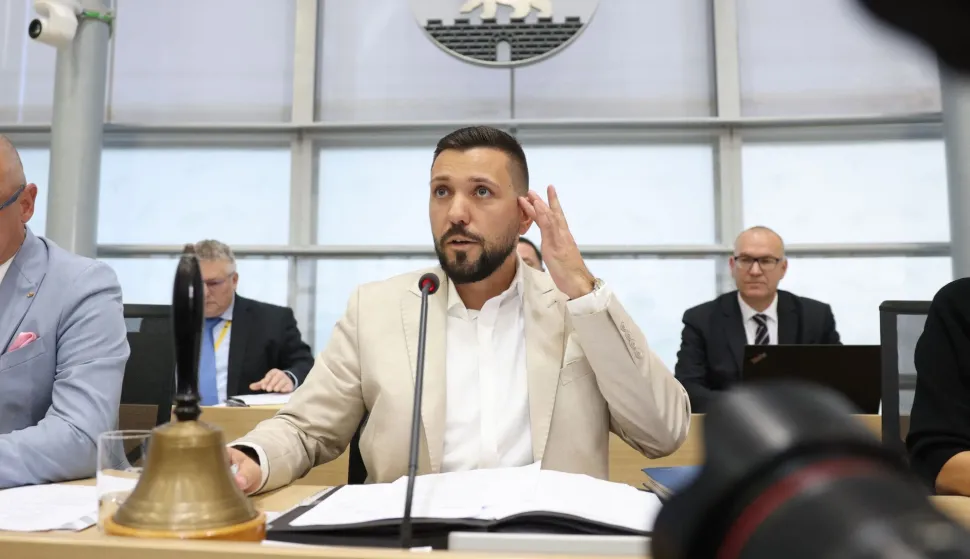 Newly elected state parliament president Tobias Rausch of the far-right Alternative for Germany (AfD) party sits at the lectern after his election during the first constituent session of the state parliament of Saxony-Anhalt in Magdeburg, eastern Germany, on October 6, 2026. Newly elected state lawmakers gather for the first time in the parliament building in the state capital Magdeburg to elect a speaker, with a candidate of the far-right Alternative for Germany (AfD) expected to win. The AfD is poised to preside over a state assembly for the first time following its landslide election victory in the eastern state of Saxony-Anhalt. The AfD took nearly 44 percent of the vote in the September 2026 state election. (Photo by Jan Woitas/POOL/AFP)