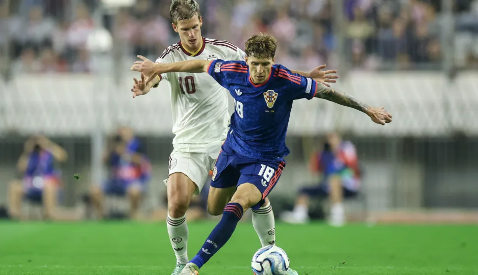 06.10.2026., stadion Poljud, Split - UEFA Liga nacija, Liga A, skupina 3, 4. kolo, Hrvatska - Spanjolska. Dani Olmo i Kristijan Jakic Photo: Sanjin Strukic/PIXSELL