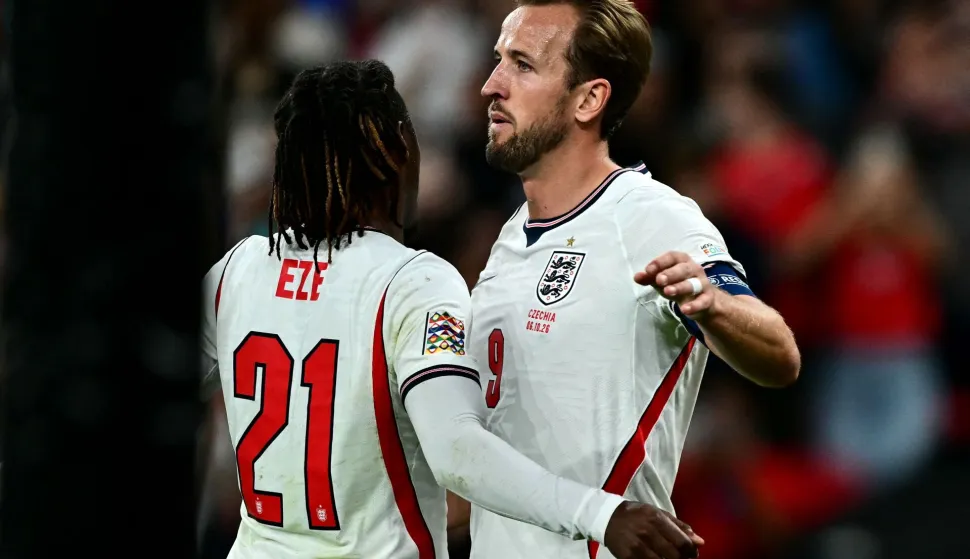 England's striker #09 Harry Kane celebrates scoring the team's second goal with England's midfielder #21 Eberechi Eze (L) during the UEFA Nations League, League A - Group 3, football match between England and Czech Republic at Wembley Stadium in London on October 6, 2026. (Photo by Ben STANSALL/AFP)/NOT FOR MARKETING OR ADVERTISING USE/RESTRICTED TO EDITORIAL USE