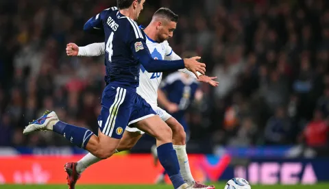 Slovenia's forward #20 Aljosa Matko (R) scores the equalising goal during the UEFA Nations League, League B, Group 1 football match between Scotland and Slovenia at Hampden Park in Glasgow, Scotland on October 6, 2026. (Photo by ANDY BUCHANAN/AFP)