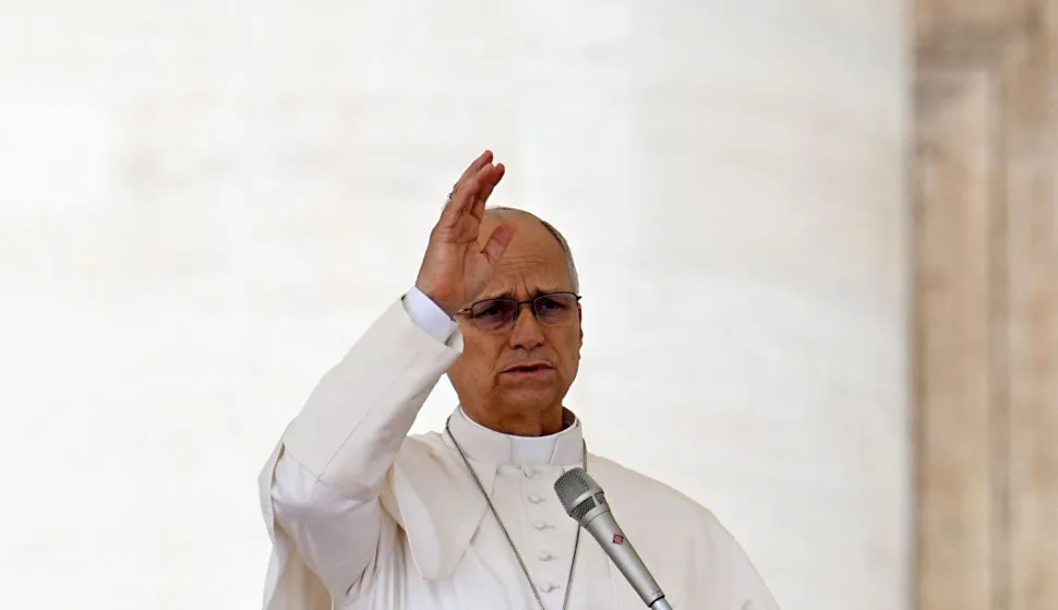 Pope Leo XIV blesses the crowd during the weekly general audience at St Peter's Square in the Vatican on October 7, 2026. (Photo by Andreas SOLARO/AFP)
