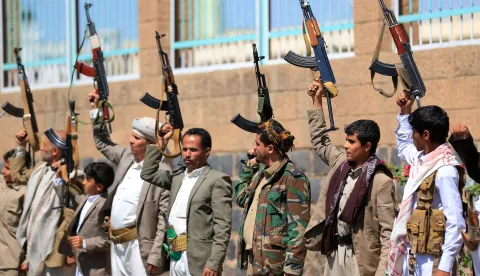 Fighters loyal to the Houthi authorities, take part in a rally to recruit more fighters, in Sanaa on October 7, 2026. The Houthis claimed a flurry of attacks on Saudi targets on October 7 including firing a ballistic missile at Riyadh airport, as the group battles for territory in Yemen against government forces supported by the kingdom. (Photo by Mohammed HUWAIS/AFP)