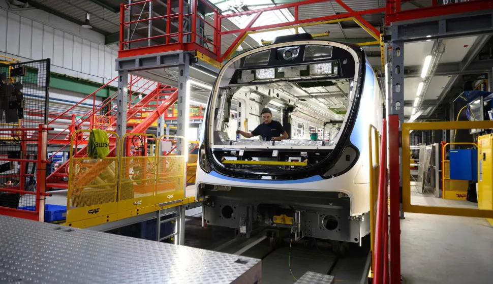 An employee works on a CAF (Construcciones y Auxiliar de Ferrocarriles) Mi20 (future RER B) train during a press visit to the Spanish railway manufacturer's factory in Reichshoffen, eastern France, on September 29, 2026. (Photo by SEBASTIEN BOZON/AFP)