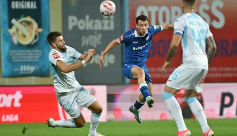 11.10.2026., stadion Ivan Kusek Apas, Koprivnica - SuperSport HNL 2026./2027., 09. kolo, NK Slaven Belupo - HNK Rijeka. Anel Husic i Lovro Banovec Photo: Vjeran Zganec Rogulja/PIXSELL