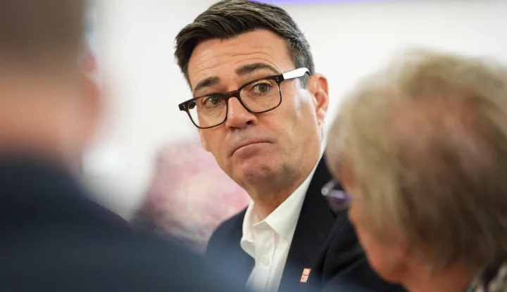 Britain's Andy Burnham looks on during a visit to the Humphrey Booth Resource Centre in Manchester, central England on October 9, 2026. (Photo by Christopher Furlong/POOL/AFP)