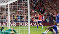 Atletico Madrid's Spanish midfielder #08 Pablo Barrios (C) celebrates scoring his team's first goal during the UEFA Champions League, league phase, matchday 2, football match between Club Atletico de Madrid and Manchester United at the Metropolitano stadium in Madrid on October 13, 2026. (Photo by Oscar DEL POZO/AFP)