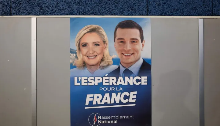 This photograph shows a poster of far-right party Rassemblement National (RN) candidate in France's 2027 presidential election Marine Le Pen and President of French far-right party Rassemblement National (RN) Jordan Bardella during the RN?s "Picardy back-to-work meeting" in Breteuil, northern France, on September 19, 2026. (Photo by Sameer AL-DOUMY/AFP)