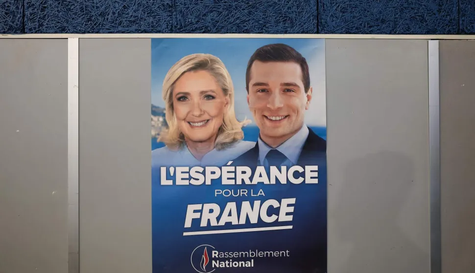 This photograph shows a poster of far-right party Rassemblement National (RN) candidate in France's 2027 presidential election Marine Le Pen and President of French far-right party Rassemblement National (RN) Jordan Bardella during the RN?s "Picardy back-to-work meeting" in Breteuil, northern France, on September 19, 2026. (Photo by Sameer AL-DOUMY/AFP)