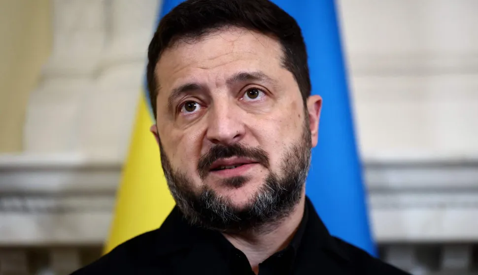 Ukraine's President Volodymyr Zelensky speaks during a meeting with Britain's Prime Minister Andy Burnham at 10 Downing Street, in central London, on October 14, 2026. (Photo by Henry Nicholls/POOL/AFP)