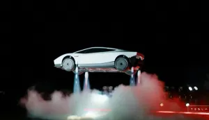 TOPSHOT - A grab taken on October 16, 2026 from a live feed released by Tesla shows the company unveiling on October 15 its next-generation Roadster electric car in McGregor, Texas, United States. (Photo by Tesla/AFP)/RESTRICTED TO EDITORIAL USE - MANDATORY CREDIT "AFP PHOTO/TESLA" - HANDOUT - NO MARKETING NO ADVERTISING CAMPAIGNS - DISTRIBUTED AS A SERVICE TO CLIENTS