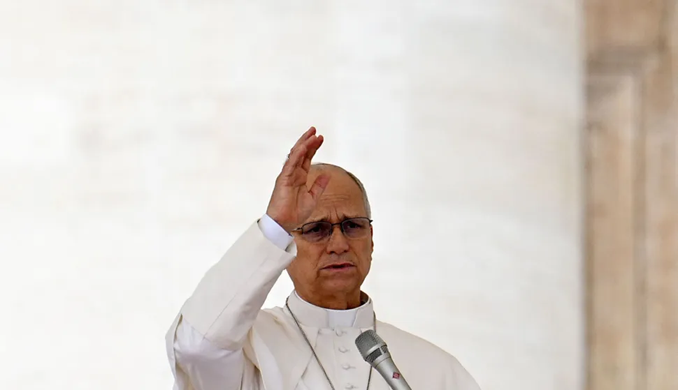 Pope Leo XIV blesses the crowd during the weekly general audience at St Peter's Square in the Vatican on October 7, 2026. (Photo by Andreas SOLARO/AFP)