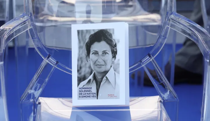 epa06854712 A photo of former French politician and Holocaust survivor Simone Veil lies on an empty chair during her burial ceremony at the Pantheon in Paris, France 01 July 2018. Former Health Minister, Simone Veil, who passed away on June 30, 2017 became president of the European Parliament and one of France's most revered politicians by advocating the 1975 law legalising abortion in France. She will be only the fifth woman buried at the monument to France's dignitaries, where she will be laid to rest at the Pantheon with her husband Antoine, a high-ranking civil servant who died in 2013. EPA/LUDOVIC MARIN/POOL MAXPPP OUT