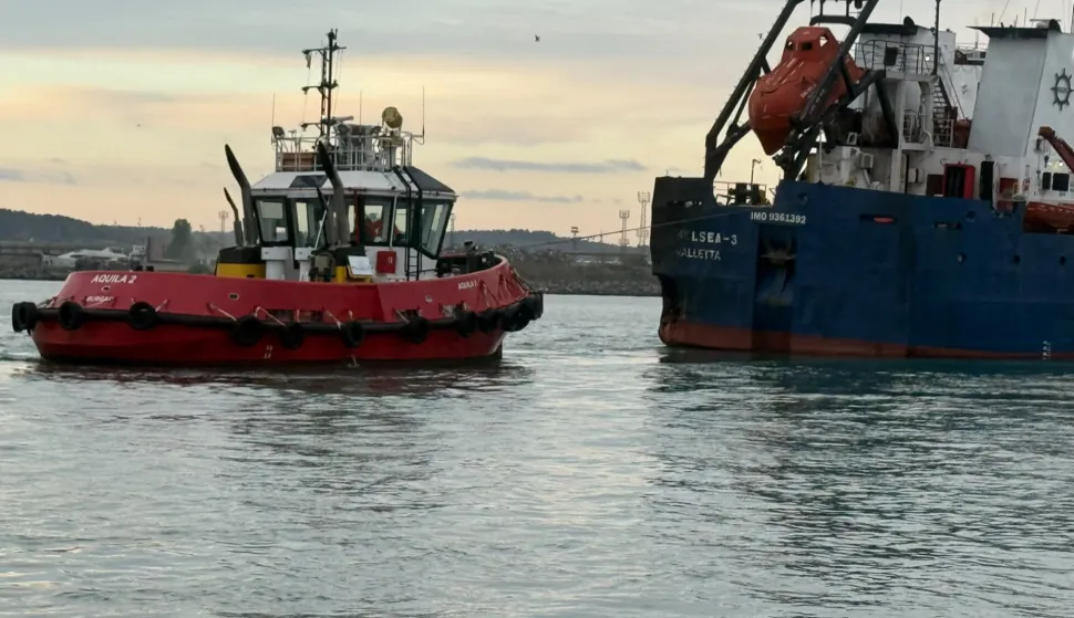 This handout photograph released by Bulgaria's Ministry of Transport and Communications on October 17, 2026, shows the Ukrainian-owned Maltese-flagged cargo ship Chelsea 3 which was "hit by three aerial drones" in Bulgaria's exclusive economic zone in the Black Sea, after it was successfully moved to the port of Burgas. Eleven people are missing after two merchant ships were struck off the Bulgarian coast on October 13, 2026, in the latest spillover from the Ukraine war in the Black Sea. (Photo by Handout/MINISTRY OF TRANSPORT AND COMMUNICATIONS/AFP)/RESTRICTED TO EDITORIAL USE - MANDATORY CREDIT "AFP PHOTO/HANDOUT/BULGARIA'S MINISTRY OF TRANSPORT AND COMMUNCATIONS- NO MARKETING NO ADVERTISING CAMPAIGNS - DISTRIBUTED AS A SERVICE TO CLIENTS