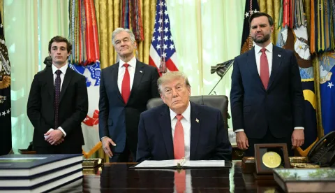 US President Donald Trump and US Vice President JD Vance (R) make an announcement on fraud in the Oval Office of the White House in Washington, DC, on October 20, 2026. Also pictured, Medicare and Medicaid Administrator Mehmet Oz (2L). (Photo by Jim WATSON/AFP)