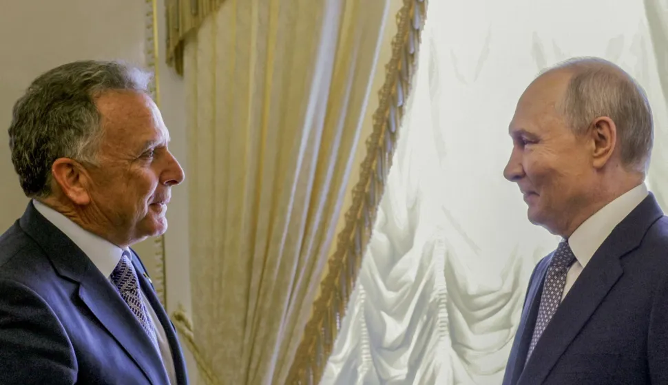 In this pool photograph distributed by the Russian state agency Sputnik, Russia's President Vladimir Putin (R) greets US special envoy Steve Witkoff (L) during their meeting in Saint Petersburg on October 21, 2026. (Photo by Gavriil GRIGOROV/POOL/AFP)/Editor's note: This image is distributed by the Russian state owned agency Sputnik