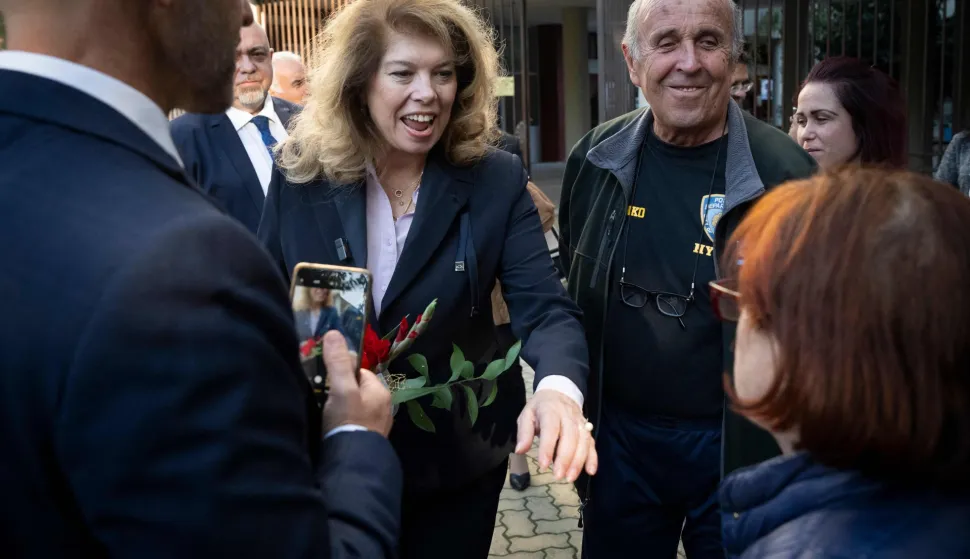 Incumbent President and Presidential candidate Iliana Iotova (CL) meets supporters during a pre-election rally in Dimitrovgrad, South Bulgaria, on October 21, 2026, prior the Presidential elections in Bulgaria on October 25. (Photo by Nikolay DOYCHINOV/AFP)