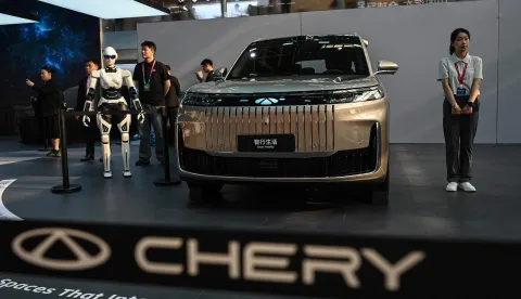 Chery?s Fengyun T11 SUV is on display at the Beijing Auto Show in Beijing on April 24, 2026. Thousands squeezed into the world's biggest car show on April 24, snapping selfies beside Chinese electric vehicles as automakers showcased AI, humanoid robots and flying-car ambitions in a cut-throat market. (Photo by Jade GAO/AFP)