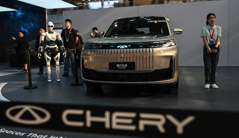 Chery?s Fengyun T11 SUV is on display at the Beijing Auto Show in Beijing on April 24, 2026. Thousands squeezed into the world's biggest car show on April 24, snapping selfies beside Chinese electric vehicles as automakers showcased AI, humanoid robots and flying-car ambitions in a cut-throat market. (Photo by Jade GAO/AFP)
