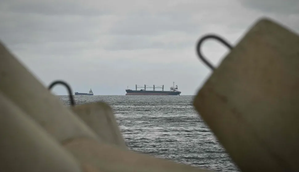 Cargo ships are seen in Black Sea from Port Varna, in Varna, eastern Bulgaria on October 13, 2026. Eleven people are missing after two merchant ships were struck off the Bulgarian coast on October 13, 2026, in the latest spillover from the Ukraine war in the Black Sea. (Photo by Nikolay DOYCHINOV/AFP)